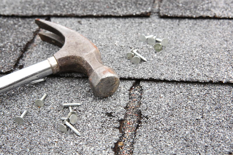 Contemplating Roof Replacement: The Professional Way vs. DIY