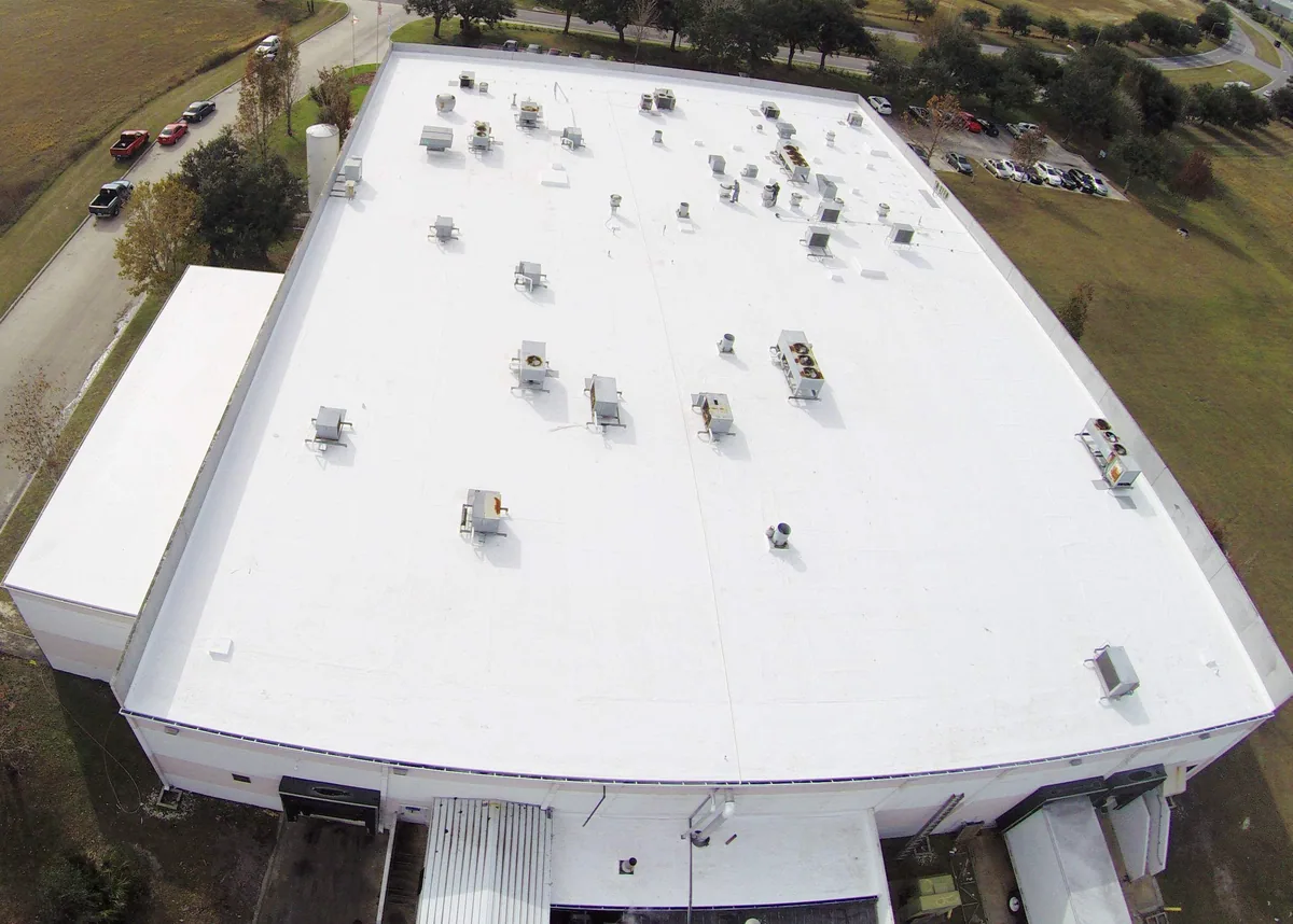 Gold Key Roofing commercial flat roof with a white membrane